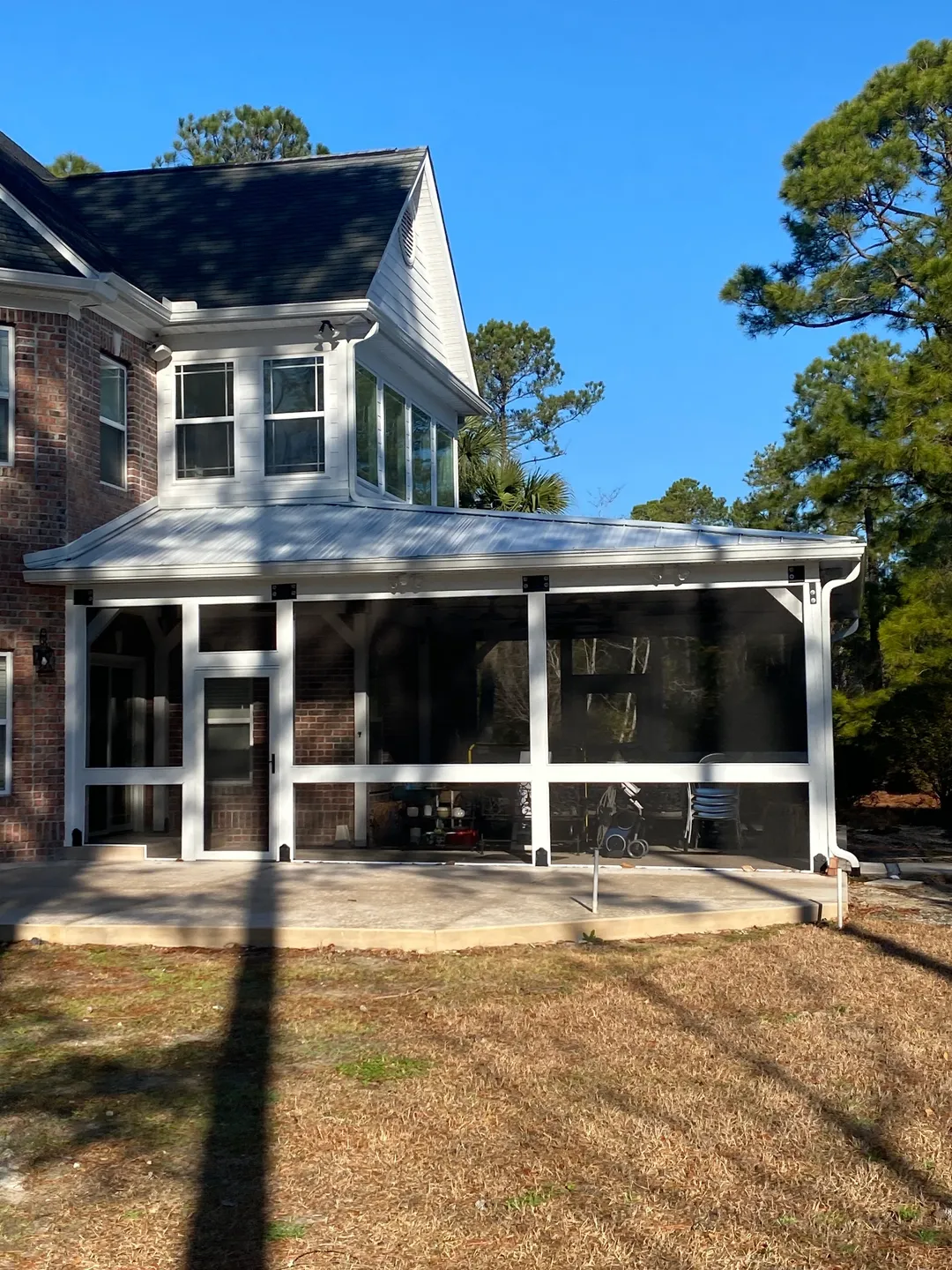 A house with a porch and patio in it